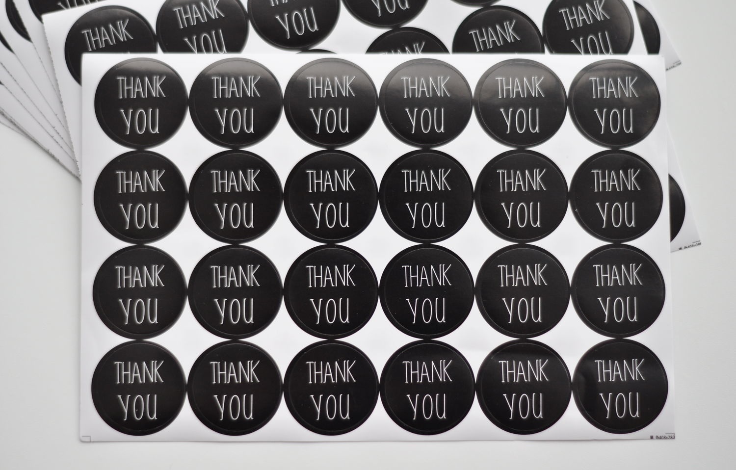 Печать черных наклеек