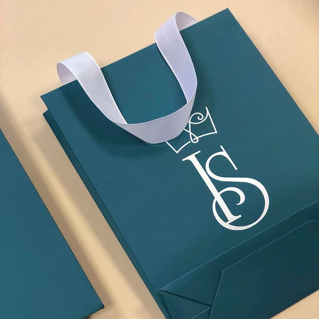 Бумажные пакеты с ленточными ручками