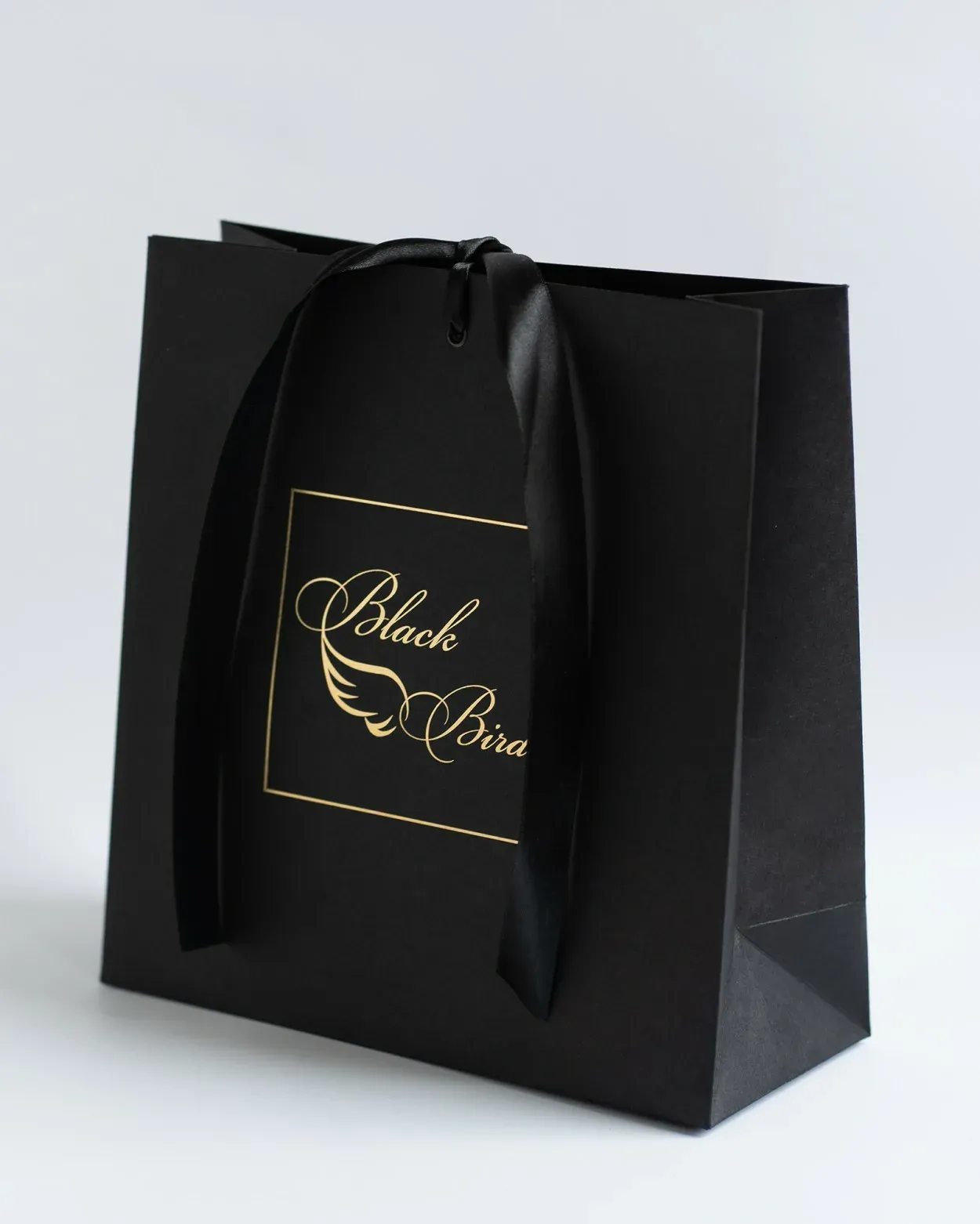 Черные бумажные пакеты со сборным дном