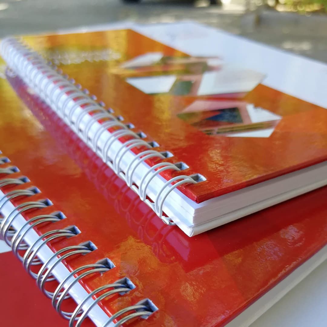 Как делают блокноты на пружине?