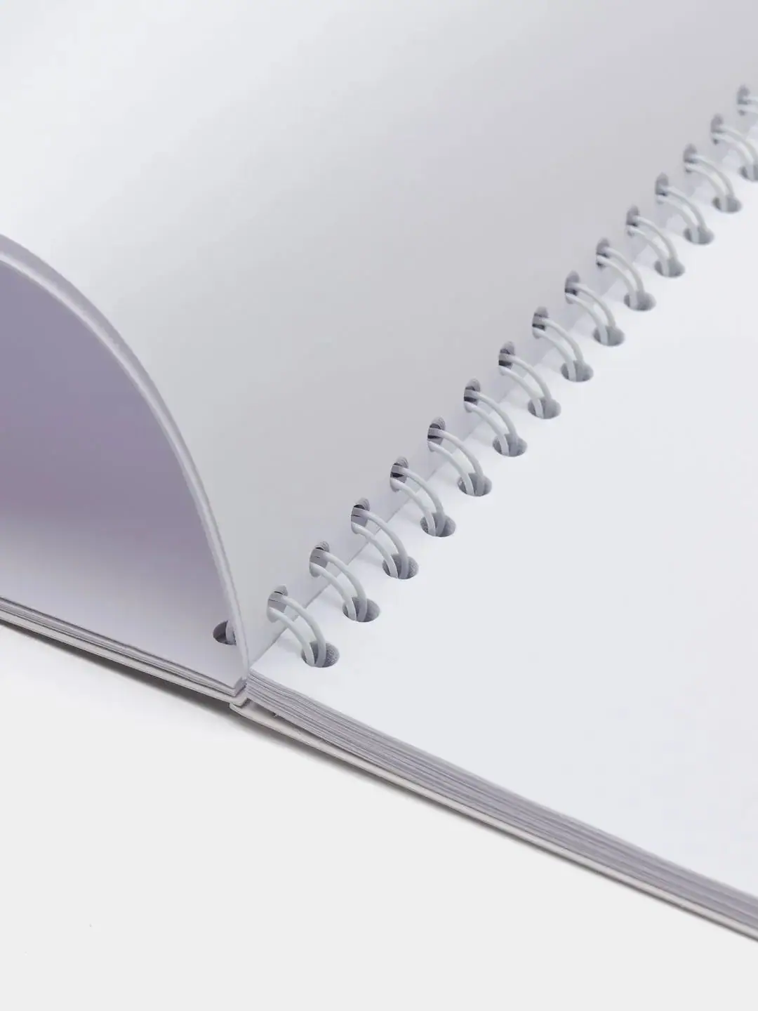 Как делают блокноты на пружине?